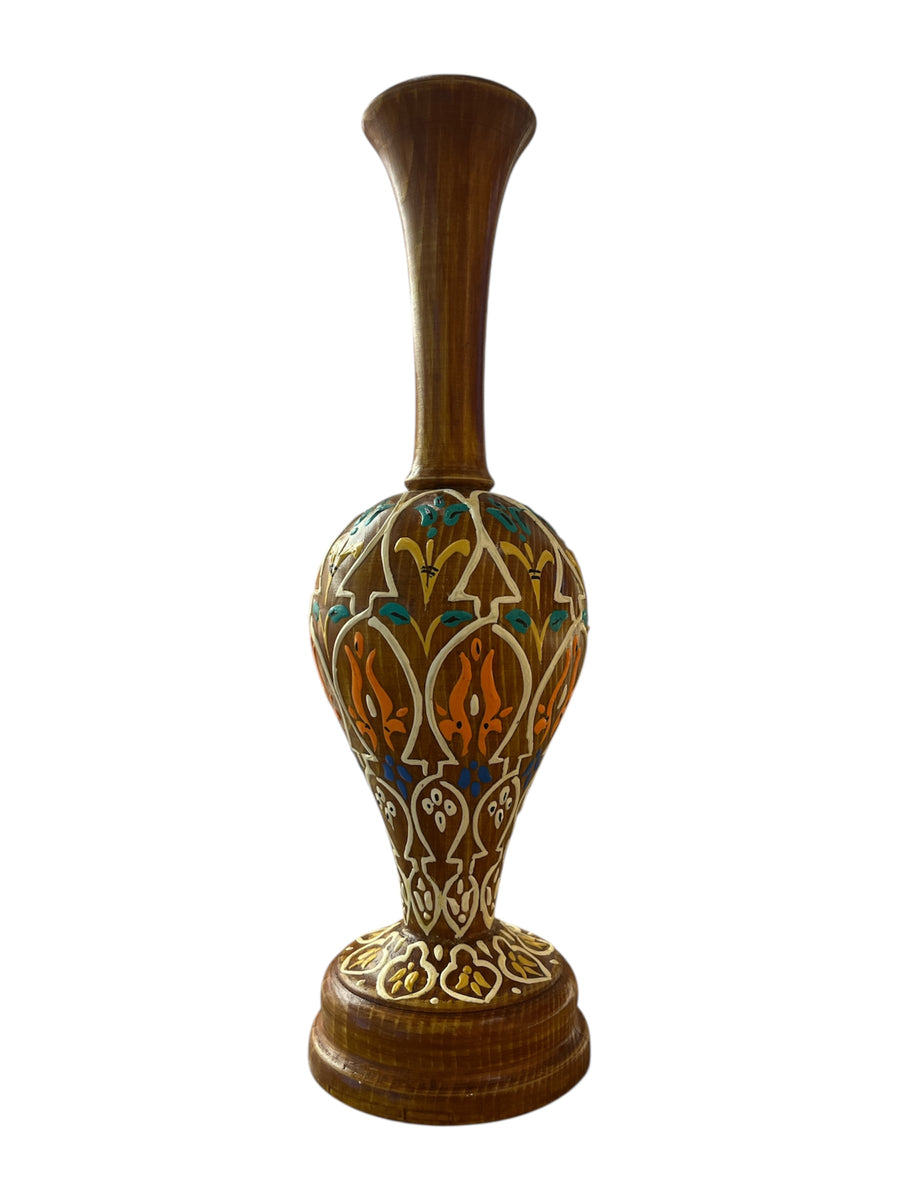 Decorative vase with intricate handmade patterns.