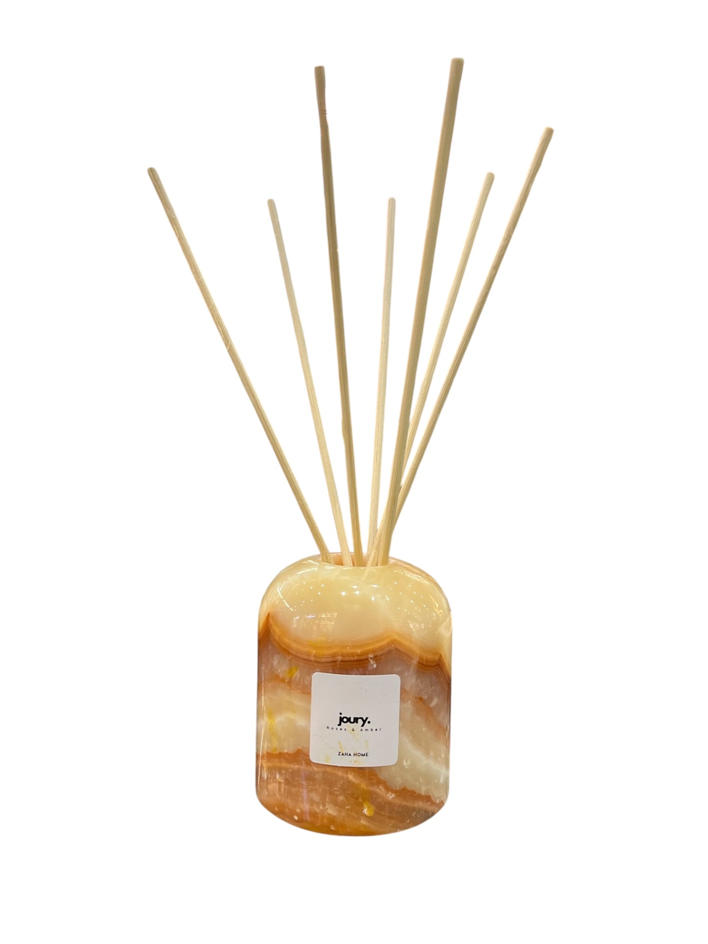 Reed diffuser with a marbled design and wooden sticks on a white background