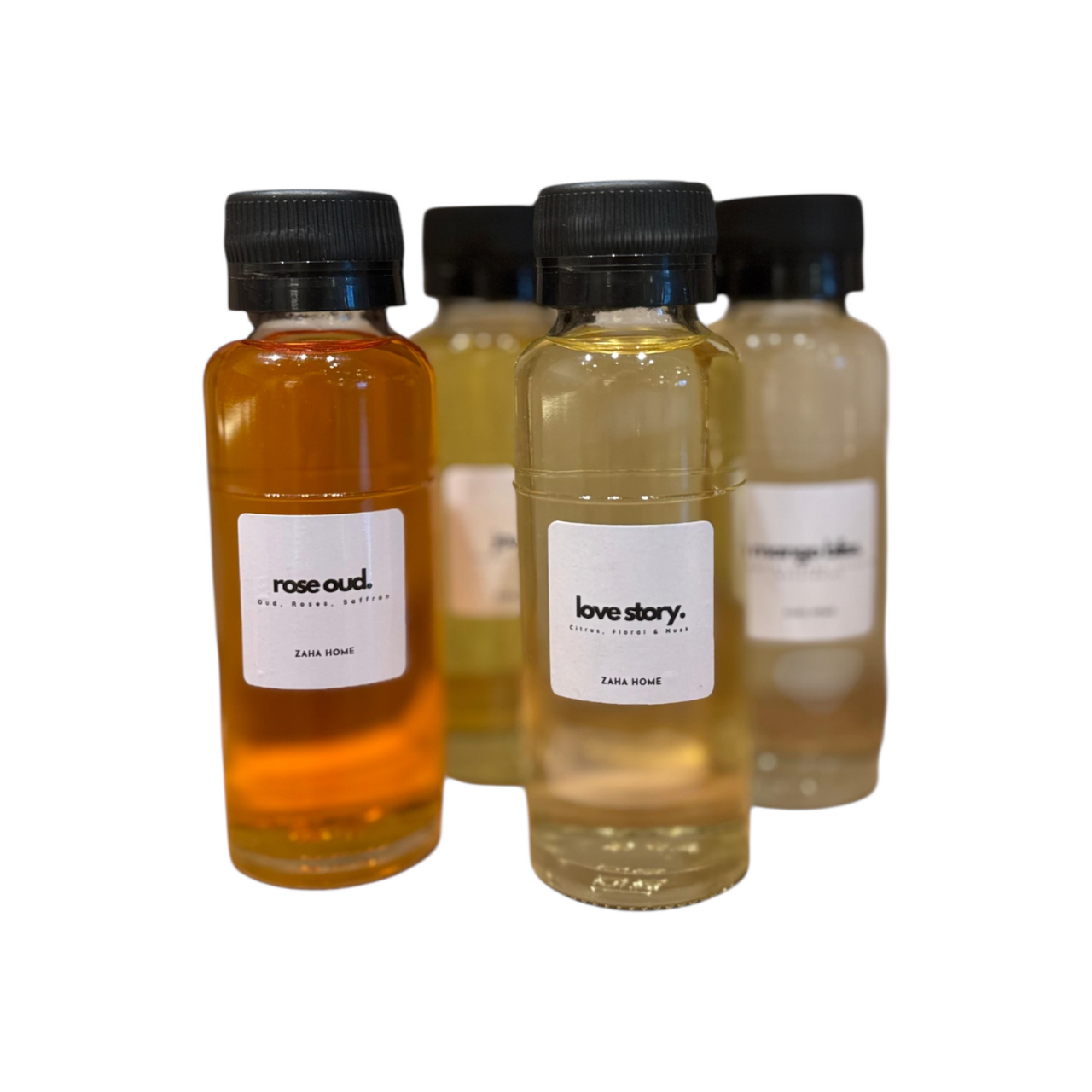 Four small bottles of different scents with labels on a white background