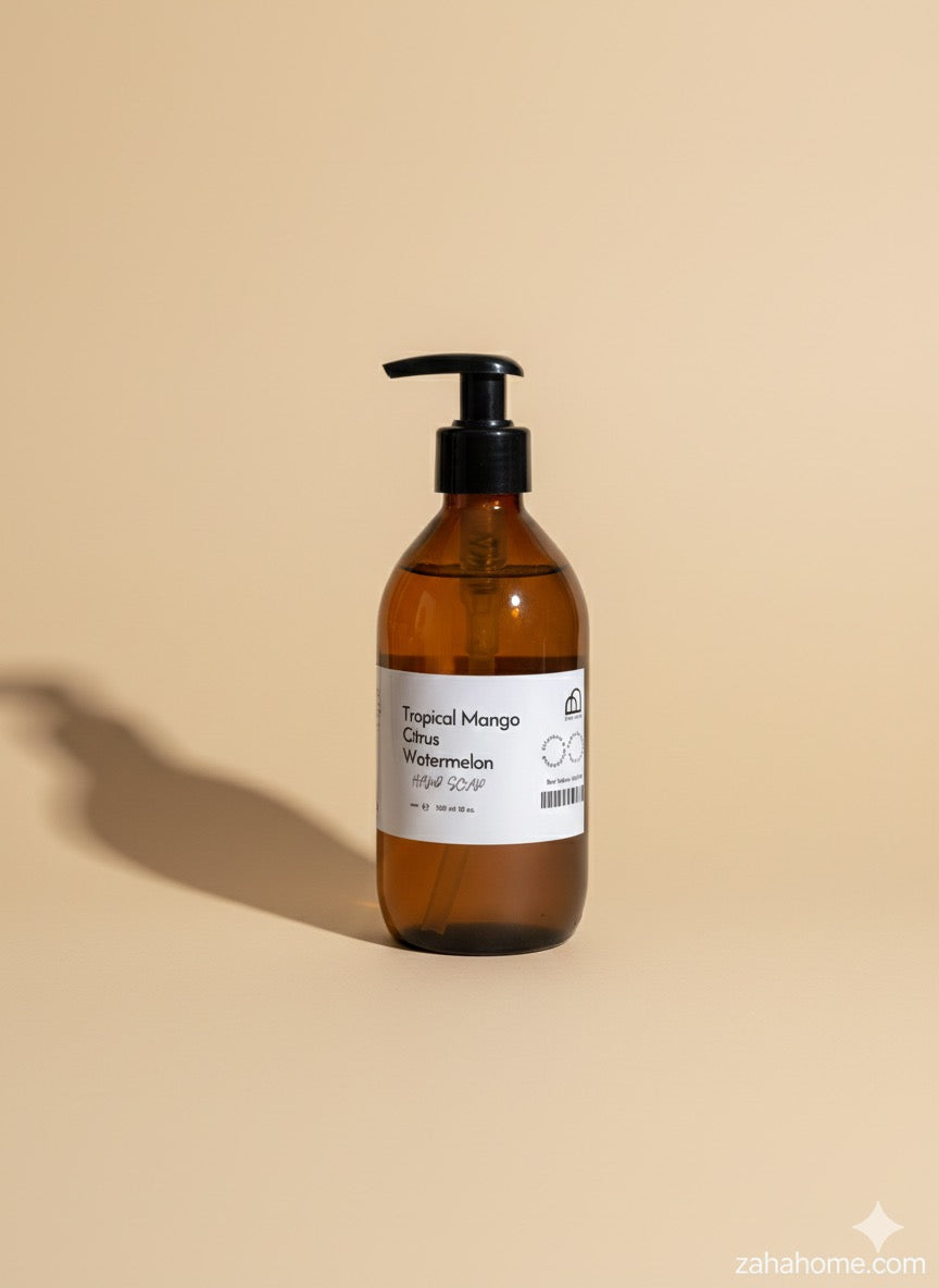 Brown liquid soap in a bottle with pump dispenser on a beige background