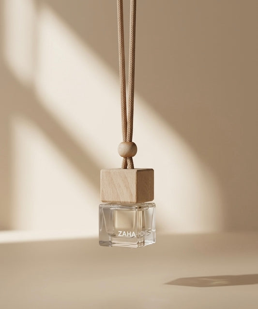 Zaha car freshener hanging on a beige background