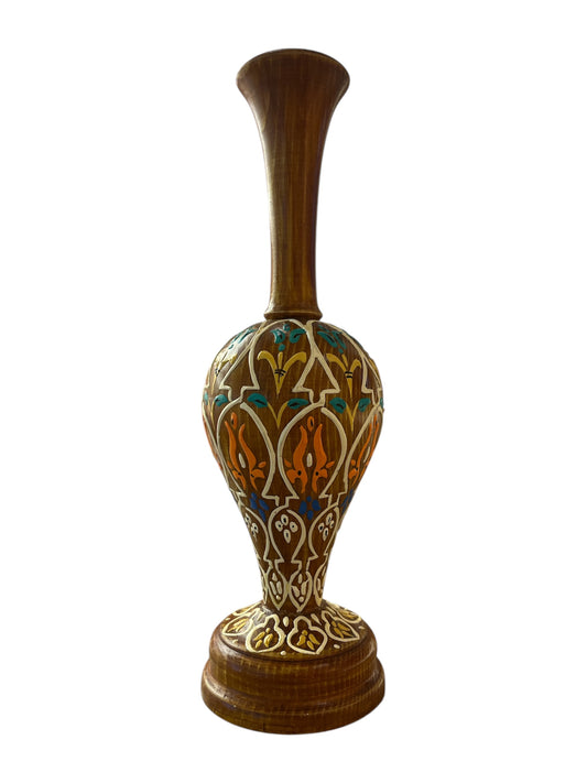Decorative vase with intricate handmade patterns.