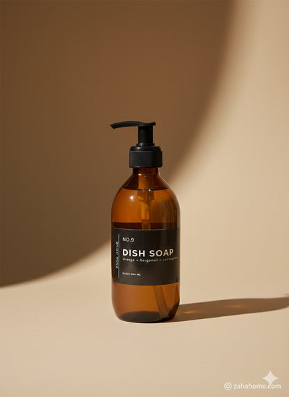 Brown dish soap bottle with pump on a beige background