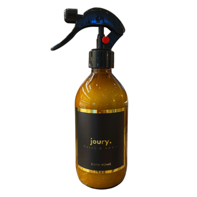 Brown spray bottle with black nozzle on a white background