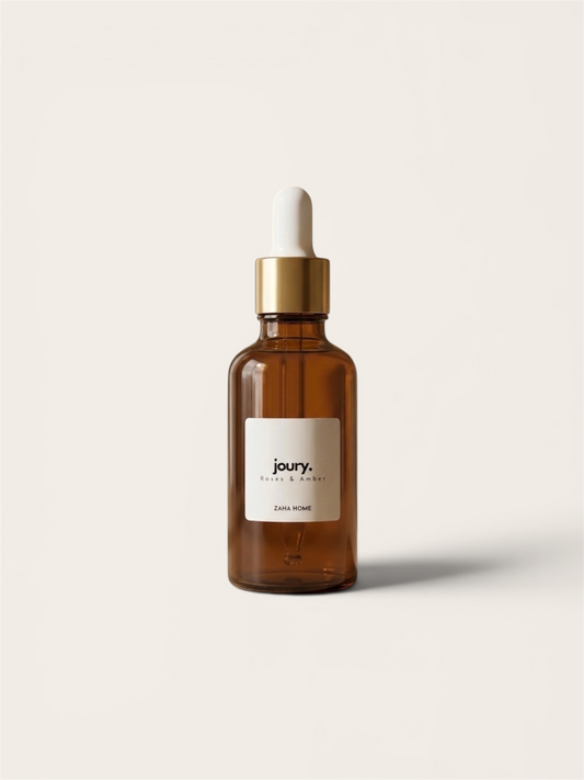 Oil Burner in brown glass dropper bottle with gold cap on a white background, featuring the 'joury.' brand.