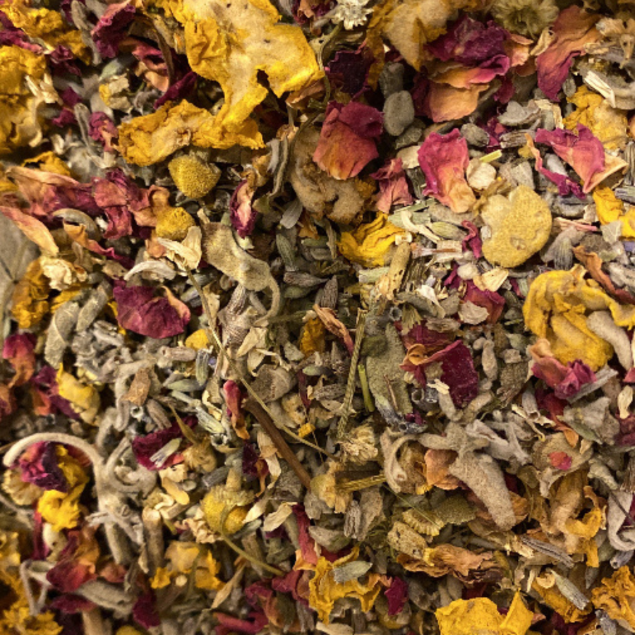 Close-up of a mix of dried flowers and herbs with various colors.