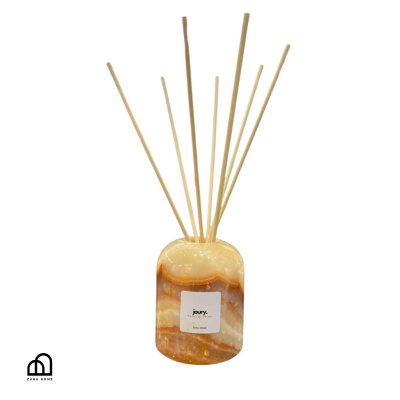 reed diffuser made from marble stone with wooden reeds 