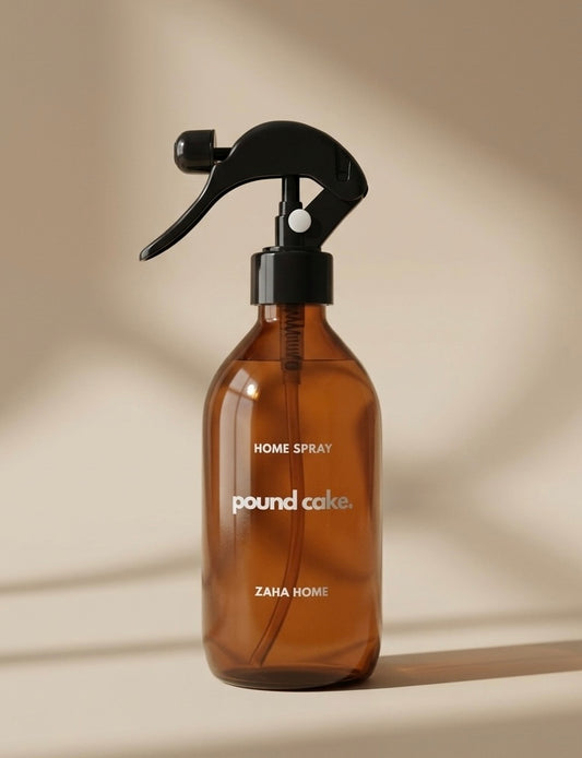 Brown home spray bottle with black nozzle on a beige background
