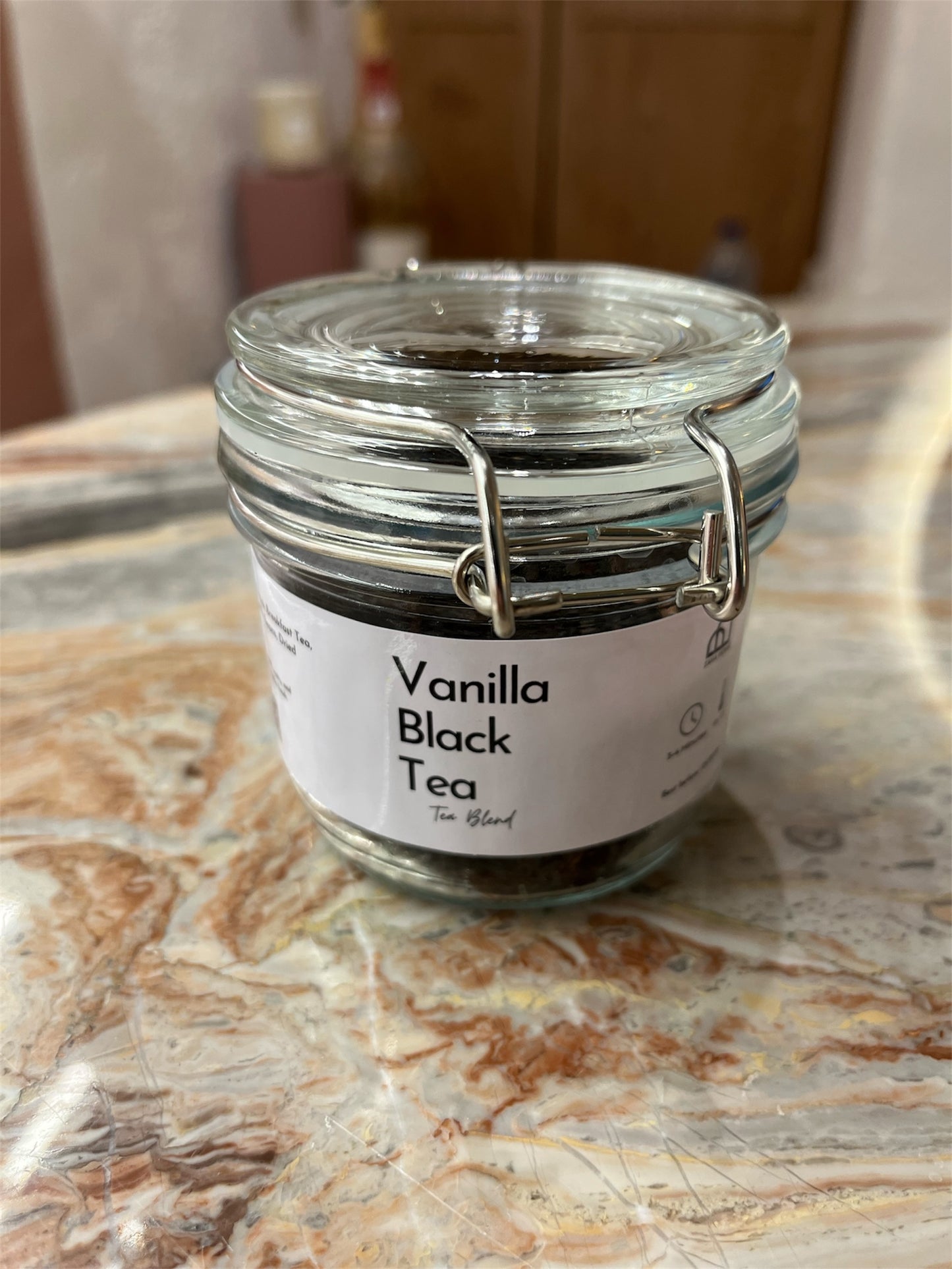 Jar of Vanilla Black Tea on a marble surface