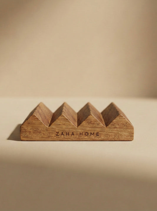 Wooden soap dish with 'Zaha Home' branding on a beige background