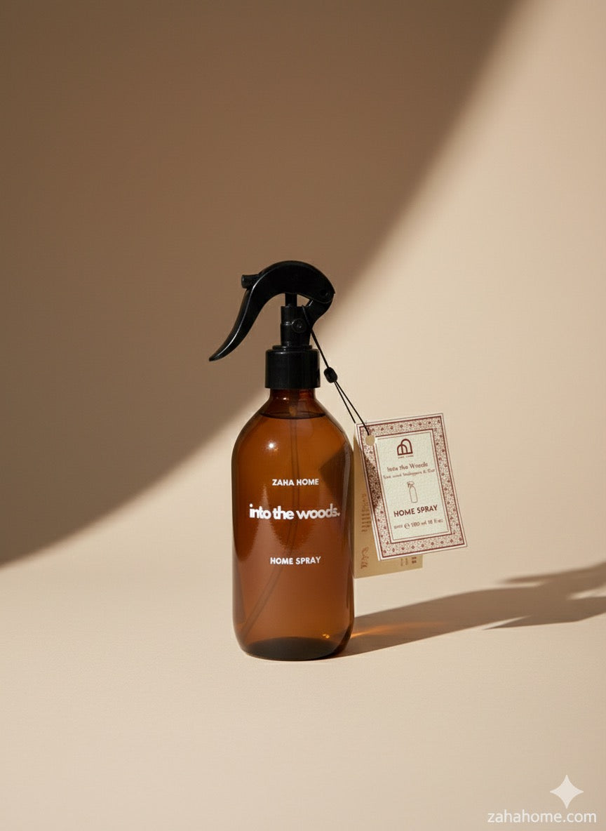 Brown spray bottle labeled 'Into the Woods' by Zara Home on a beige background